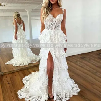 Зашеметяващ апликация Дантелено сватбена рокля Спагети-Штапельки Много Дълги вечерни рокли с цепка отстрани на Сватбена рокля